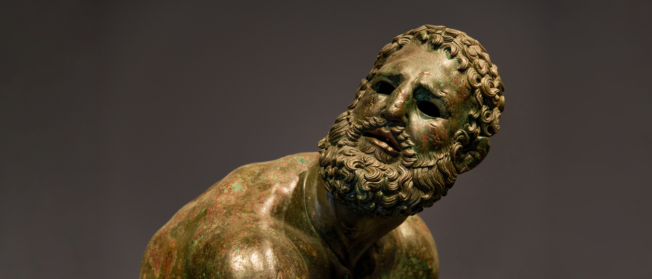The bronze Boxer at Rest statue from Hellenistic Greece.